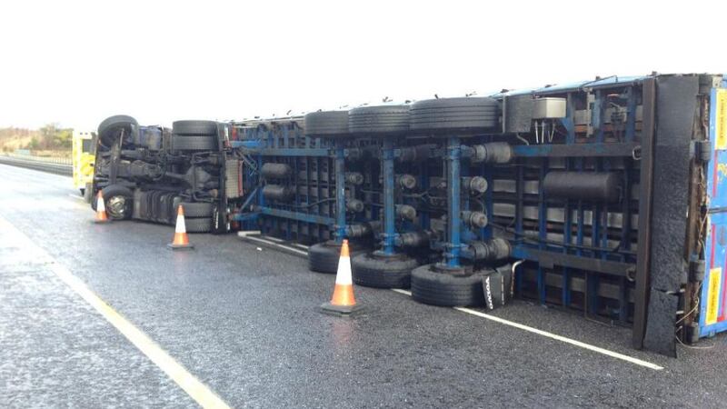 A truck overturned on M8 at Fermoy overpass. The driver was taken to hospital with a minor injury. Photograph courtesy of An Garda Síochána.