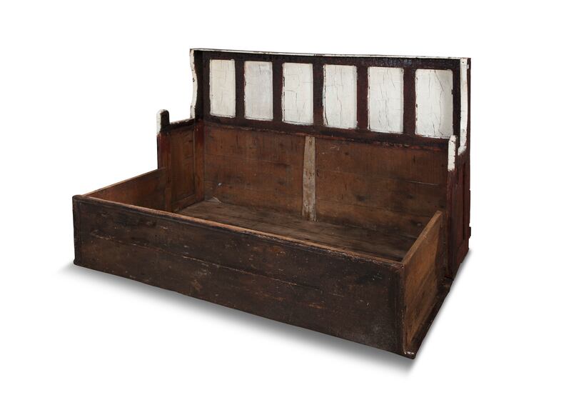 Irish pine settle bed at Adam's Auctioneers