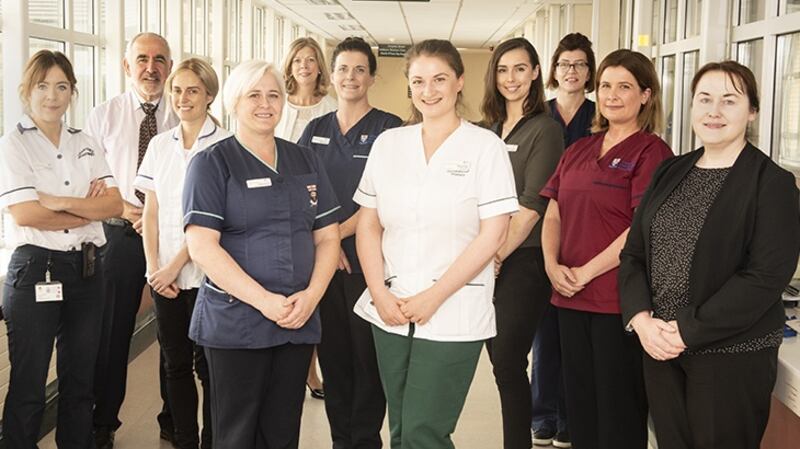 Tallaght University Hospital has launched a campaign to ensure patients remain active during their hospital stay  The Walk Your Way Back Home campaign will see patients encouraged to spend as much time as possible out of bed during their stay in Hospital. Pictured (from left): Gillian Harte (physiotherapist); Prof Des O’Neill (Consultant Geriatrician); Rebecca Madden (Dietitian); Claire Noonan (ANPc Gerontology); Áine Lynch (Director of Nursing); Audrey Cronin (Safer Mobility Co-Coordinator); Maeve Ryan (Occupational Therapist); Marguerite Vaughan (Pharmacist); Jane Hally (Clinical Nurse Manager Age Related Healthcare); Jodie Keating (Clinical Nurse Specialist in Falls) and Christina Lydon (Nurse Practice Development).