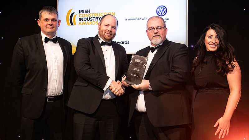 Michael Duff, Awards Judge presents the Excellence in Health & Safety award to the CField Construction team.