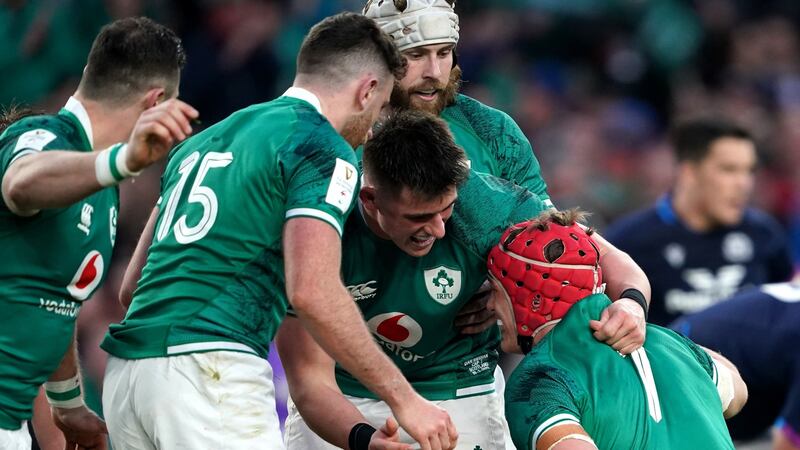 The Irish team celebrate their third try in the win over Scotland. Photograph: Brian Lawless/PA