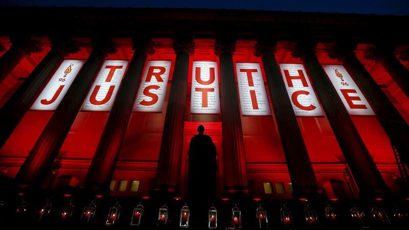Liverpool’s St George’s Hall is illuminated following a vigil in memory of the victims of the Hillsborough disaster in the aftermath of the inquest verdict. Photograph: Reuters