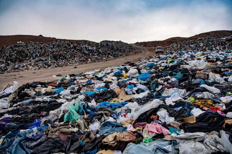 View of used clothes discarded in the Atacama desert in Alto Hospicio, Iquique, Chile. Photograph: Martin Bernetti/AFP via Getty Images