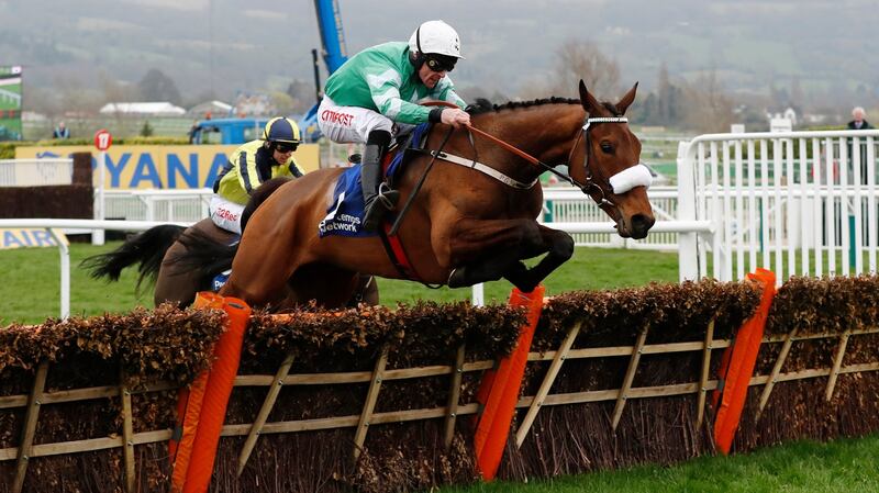 Davy Russell on Presenting Percy in action on the way to winning the Pertemps Network Final Handicap Hurdle at Cheltenham: Stefan Wermuth/Reuters/Livepic