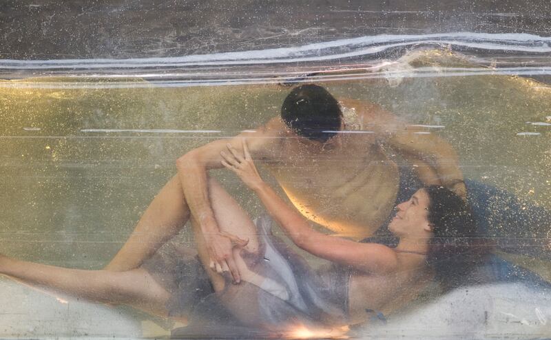 Dido and Aeneas: dancers perform in water for a production of Henry Purcell's opera by the German choreographer Sasha Waltz. Photograph: John MacDougall/AFP via Getty