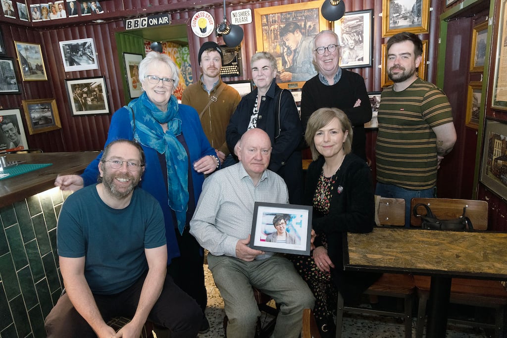Lyra McKee's sister, Nichola McKee Corner, who is seated front right, joins Seamus Dooley, Anne Hailes, Ciaran Hanna and others at the unveiling. Photograph: Kevin Cooper/Photoline