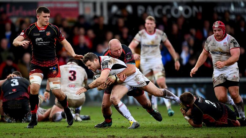 Darren Cave carries during Ulster’s win in Newport. Photograph: Alex Davidson/Inpho