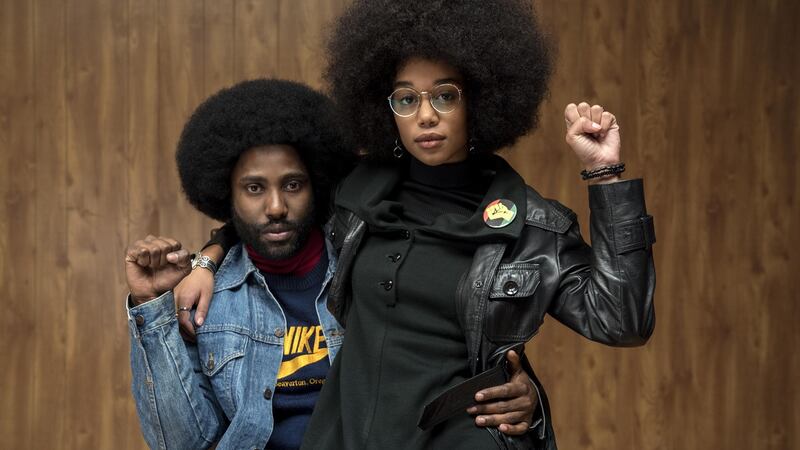John David Washington and Laura Ruth Harrier star in BlacKkKlansman.