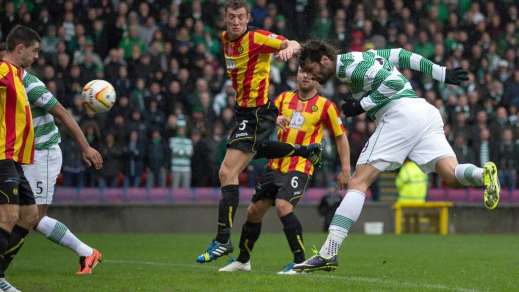 Celtic’s Georgios Samaras heads home the opener against Partick Thistle.