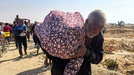 US group distributing aid in Gaza reopens sites after fatal shootings