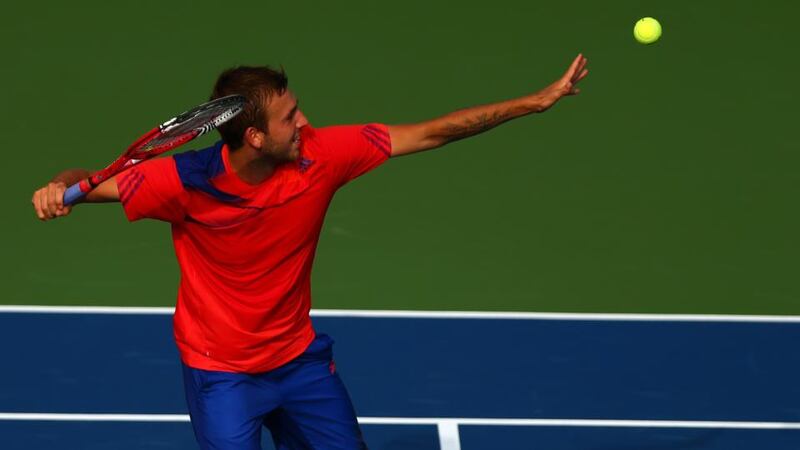 Dan Evans celebrates beating Bernard Tomic. Photograph: Dan Istitene/Getty Images