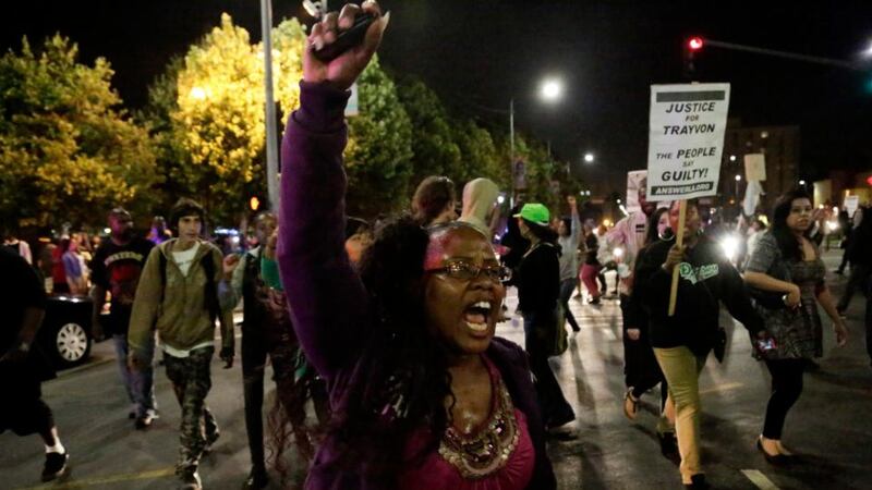 Protesters march in the Leimert Park area of Los Angeles following the George Zimmerman acquittal. Photograph: Jason Redmond/Reuters