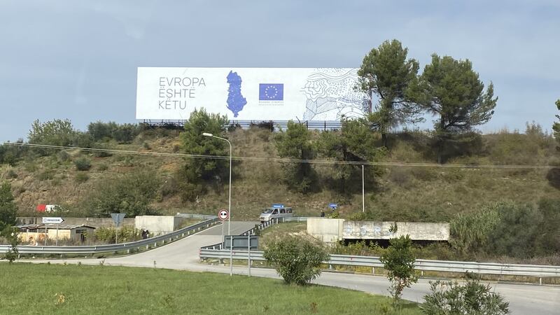 Overlooking a roundabout outside the town of Rrogozhinë, in the country’s Western Lowlands region, a massive EU billboard declares in Albanian “Europe is here”. Photograph: Dan Griffin
