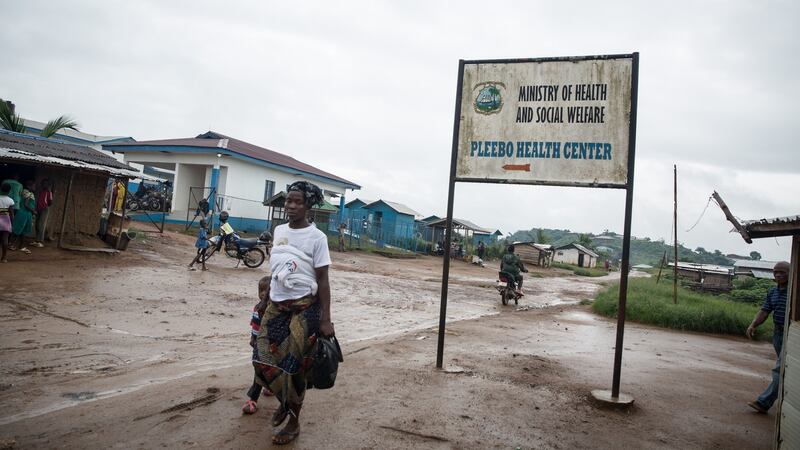 A sign points to Pleebo Health Centre, where some patients are diagnosed with TB in Maryland, Liberia. Photograph: Sally Hayden