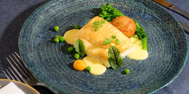 North Atlantic halibut served with a Keem Bay smoked fish cake and a velvety beurre blanc. Photograph: Michael McLaughlin