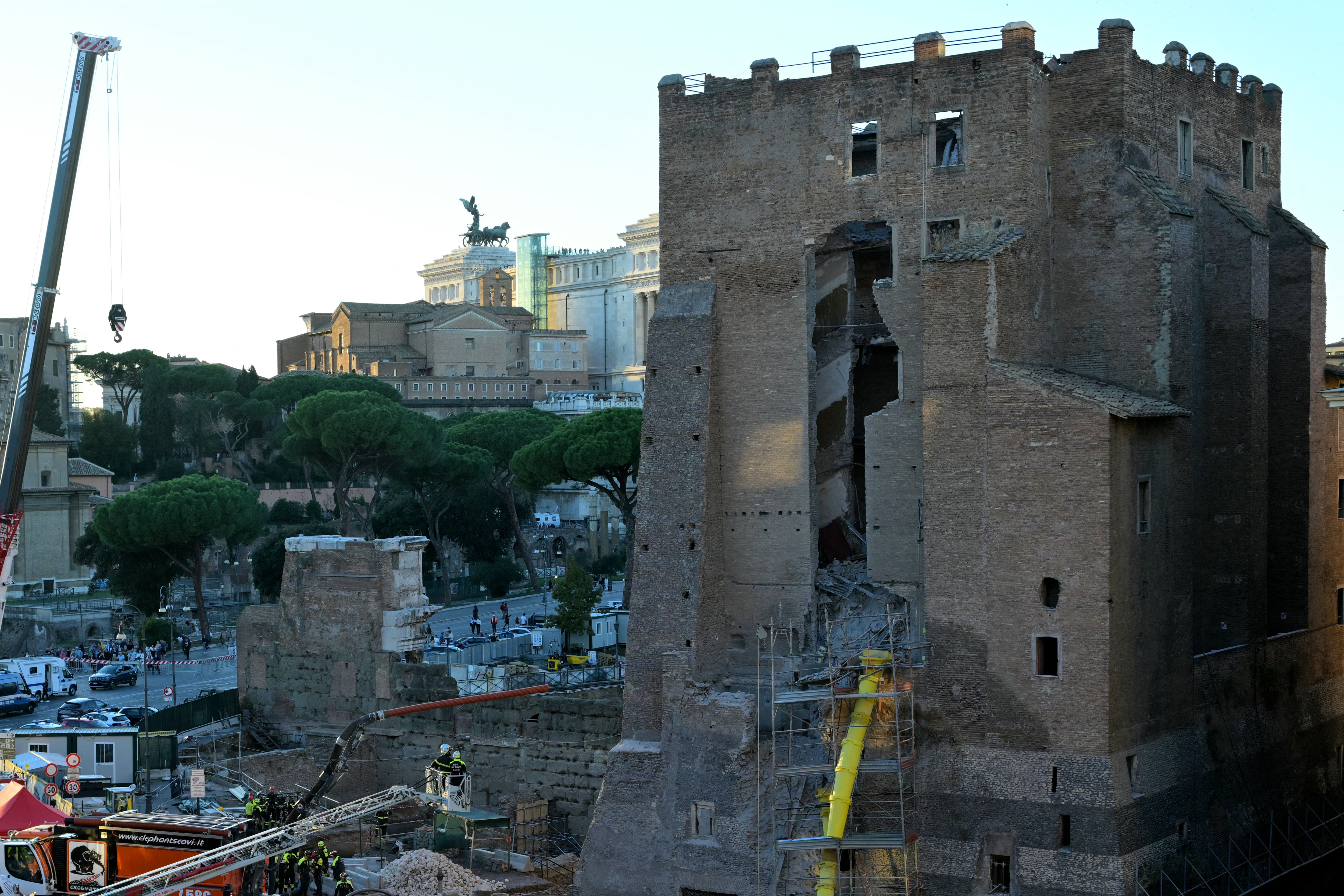Worker rescued from partially collapsed medieval tower in Rome dies in hospital