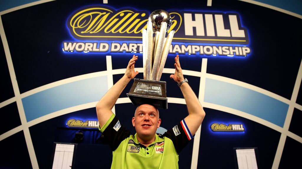 Michael Van Gerwen celebrates his 2019 PDC World Darts Championships win. Photograph: Steven Paston/PA