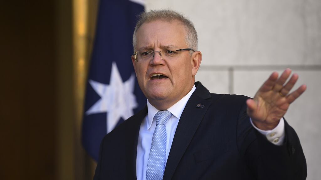 Australian Prime Minister Scott Morrison speaks to the media during a press conference at Parliament House in Canberra. Lukas Coch/EPA