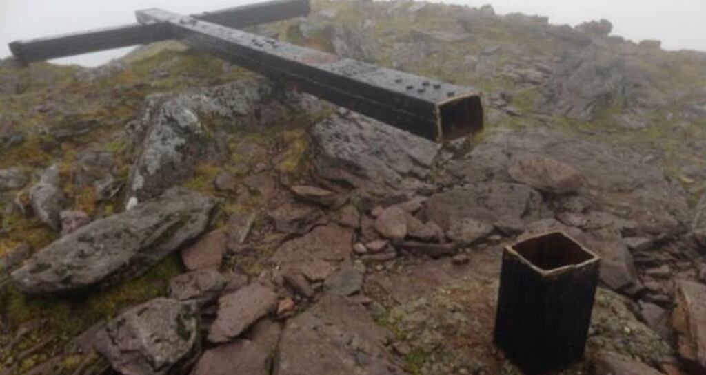 It is not known who cut down the cross on top of  Carrauntoohil which was erected on the mountain in 1976 with the aid of about 100 people. Photograph: Cronins Yard/Twitter