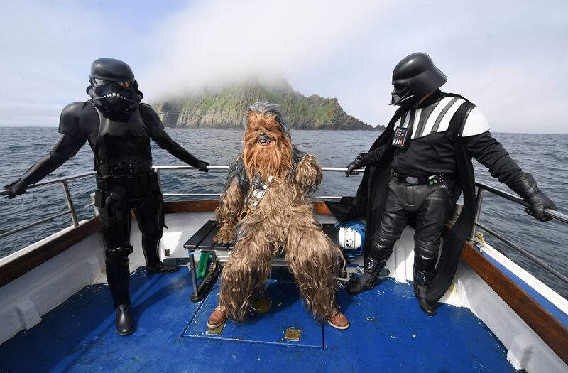 Fans in costume visiting Skellig Michael, which has featured in Star Wars. Photograph: Justin Kernoghan/Photopress Belfast