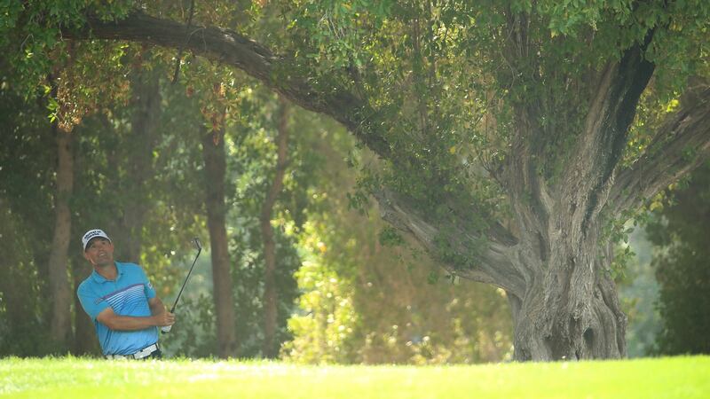 Pádraig Harrington plays his second shot on the second hole during the final round of the Omega Dubai Desert Classic at Emirates Golf Club. Photo: Andrew Redington/Getty Images
