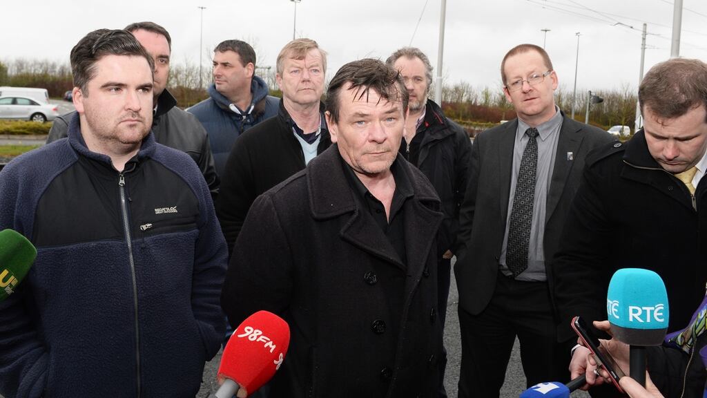 Siptu officials including Willie Noone (centre) announce a decision by members working on the Luas light rail system not to accepted a pay deal which will result in further strike action. Photograph: Cyril Byrne/The Irish Times.