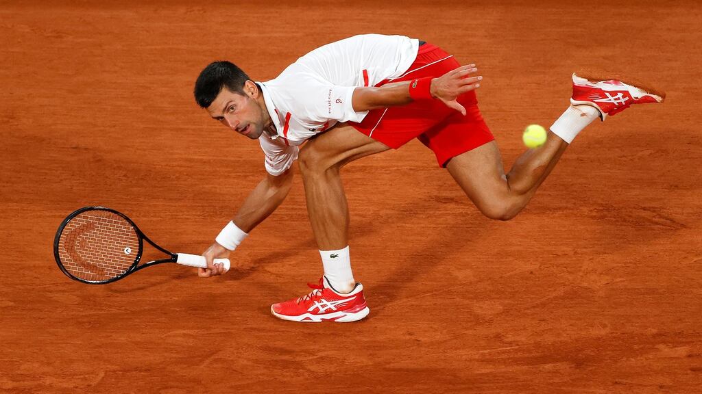 Novak Djokovic plays a forehand during his men’s singles first round match against Mikael Ymer of Sweden on day three of the 2020 French Open at Roland Garros. Photo: Clive Brunskill/Getty Images