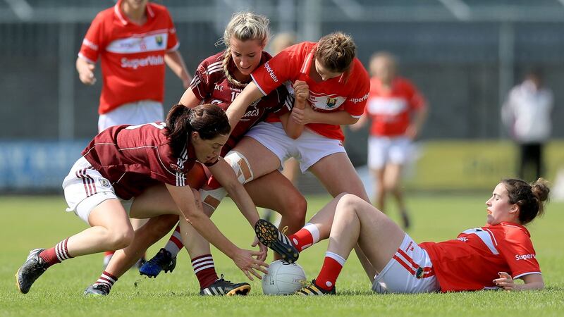 Cork’s Eimear Scally and Shauna Kelly with Emer Flaherty and Megan Glynn of Galway. Photograph: Donall Farmer/Inpho