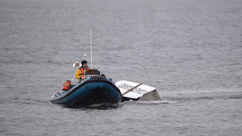 Debris from the Rescue 116 helicopter being taken to the pier in Blacksod, Co Mayo. Photograph: Dara Mac Dónaill