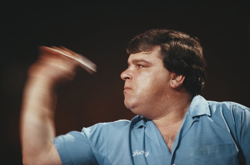 Jocky Wilson in action during the Embassy World Darts Championship in January 1989 at the Lakeside Country Club in Frimley Green, Surrey. Photograph: Bob Martin/Getty Images