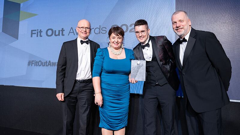 Josh Denton, group pre-construction director at Radii, presents the excellence in design collaboration award to the JCA Architects team