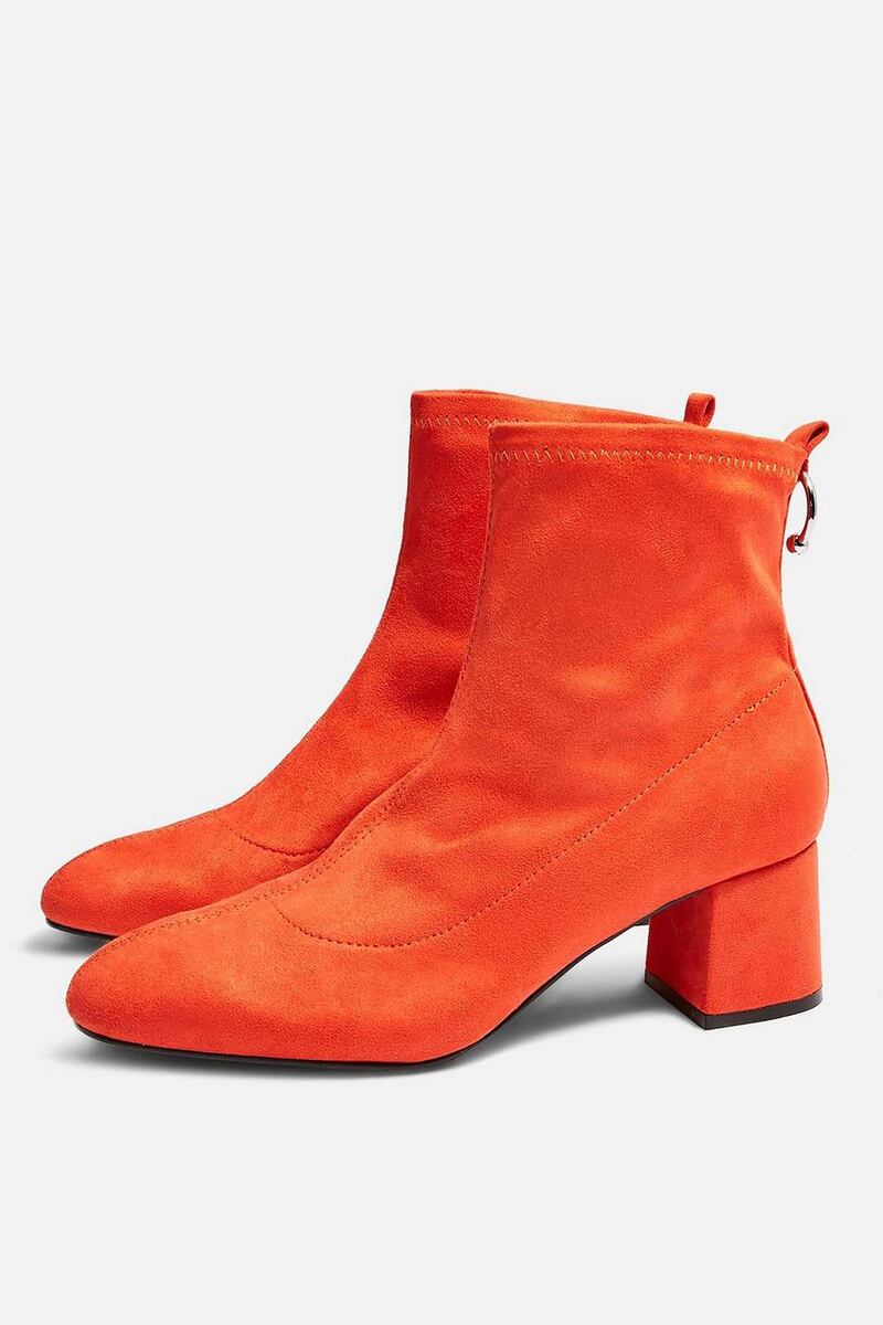 Red suede “Blossom” boots with ring detail €50 from Topshop