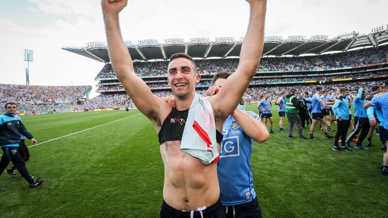 James McCarthy celebrate after the game. Photograph: Ryan Byrne/Inpho