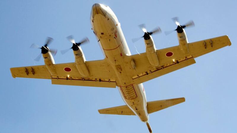 A Japanese P3 Orion takes off from the Royal Australian Air Force (RAAF) Pearce air base to take part in the search trying to locate missing Malaysia Airways Flight MH370, in Perth, Western Australia, Australia, today. Nine military aircraft, two civil aircraft, and 11 ships are assisting in the search. Photograph: Richard Wainwright/EPA