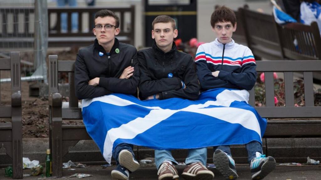 Dejected Yes supporters in Glasgow yesterday. Photograph: Robert Perry