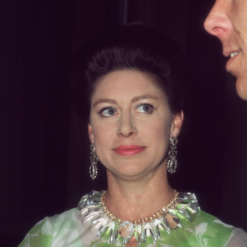 Britain’s Princess Margaret at the Royal Festival Hall after a Frank Sinatra concert in aid of the NSPCC on May 7th, looking up at her husband Lord Snowdon. Photograph: Mike Lawn/Fox Photos/Getty Images