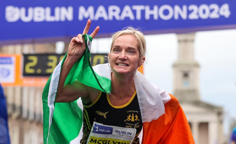 Ann Marie McGlynn celebrates winning the women’s national championship at last year's Dublin Marathon. Photograph: Ben Brady