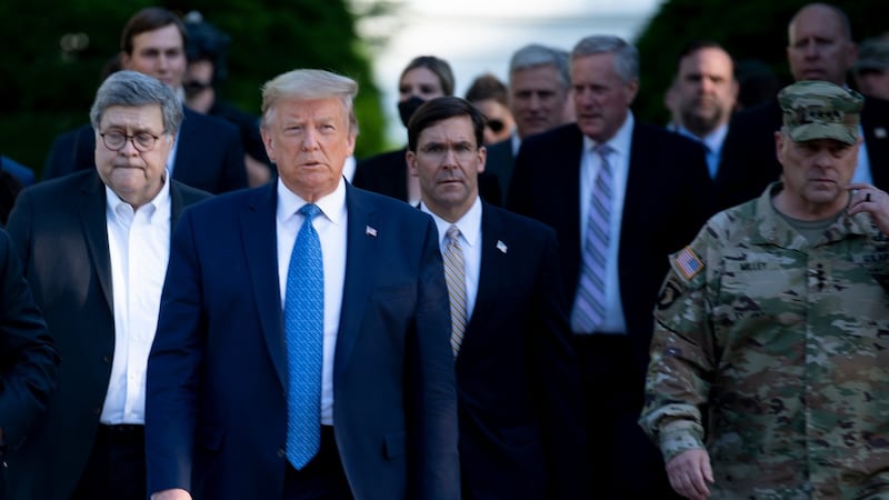US president Donald Trump, with chairman of the joint chiefs of staff Mark Milley (far right), walking from the White House to visit St John’s Church on June 1st. Photograph: Brendan Smialowski/AFP via Getty Images