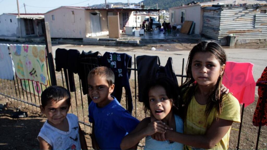 Children from a Roma community at a settlement north of Athens. Photograph: Milos Bicanski/Getty Images