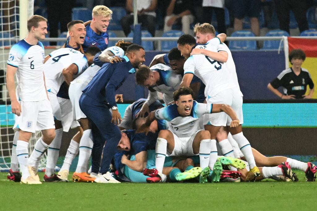 England's players celebrate winning the Uefa European Under-21 Championship final football match between England and Spain. Photograph: Vano Shlamov/AFP via Getty