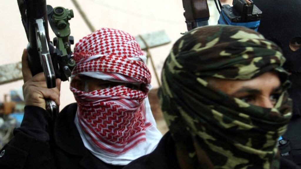 Masked Sunni gunmen take up position in Fallujah city, western Iraq. The Iraqi army has started a large-scale campaign to expel militants linked to al-Qaeda from an area in the volatile western province of Anbar. Photograph: EPA/Mohammed Jalil