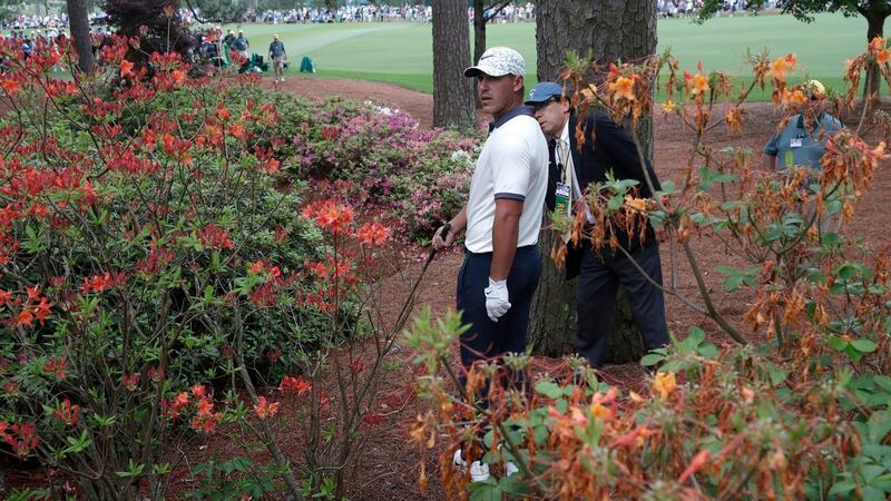 Brooks Koepka in the rough on the second after a poor tee shot. Photograph: Mike Segar/Reuters