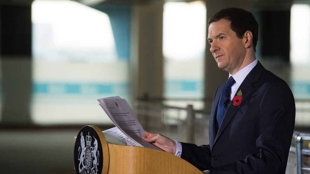 British Chancellor of the Exchequer George Osborne delivers a speech at Imperial College London’s White City Campus in London on Monday. Osborne announced plans to cut the budgets of four government departments by 30 per cent, while details of further government spending are due to be announced later this month. (Photograph: WILL OLIVER/EPA)