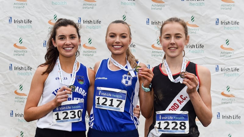 Junior women’s medallists Danielle Done (silver), Jodie McCann (gold) and Maeve Gallagher (bronze) at the National Cross Country Championships in Dublin in November. Photograph: Sam Barnes/Sportsfile