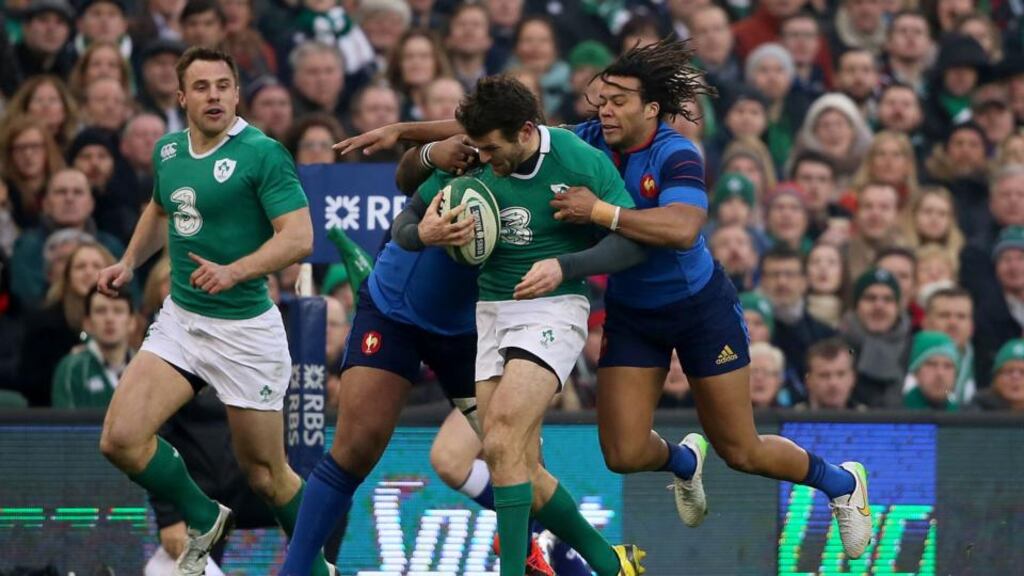 Ireland’s Jared Payne is tackled by France’s Teddy Thomas during the Six Nations clash at the Aviva Stadium, Dublin. Photo. Niall Carson/PA