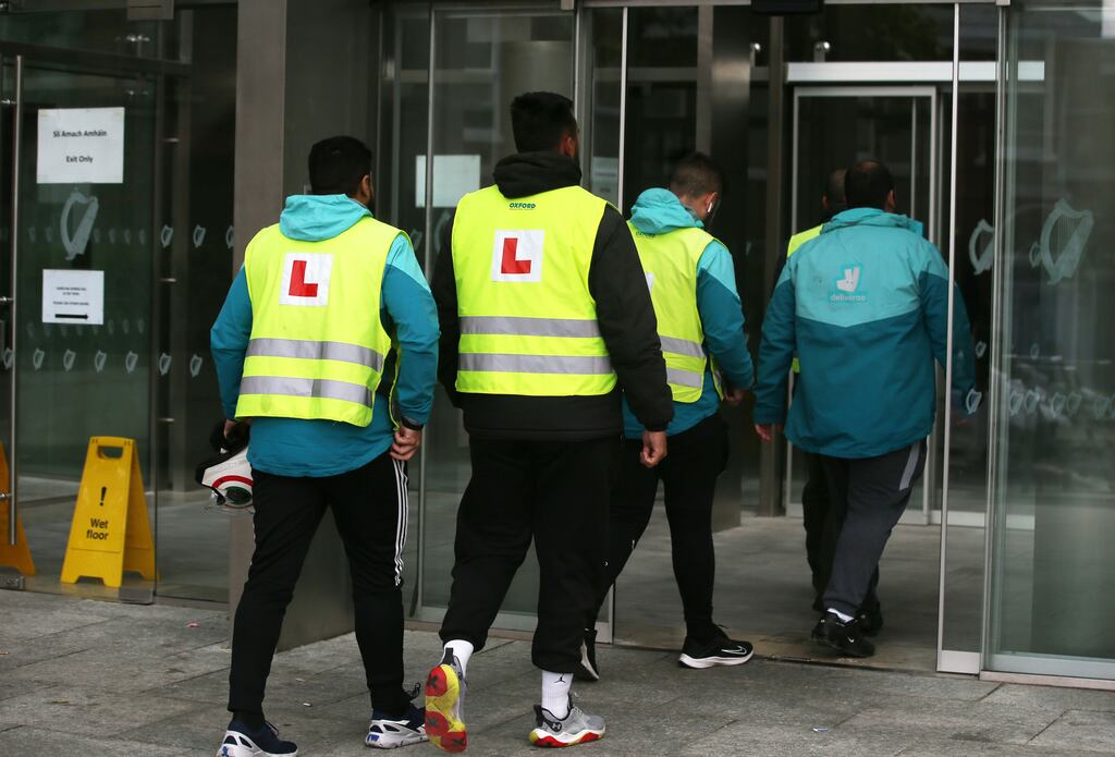 Deliveroo delivery riders arriving at the George Gonzaga Bento trial at the Central Criminal Court in Dublin: Mr Bento (36) is charged with murdering 16-year-old Josh Dunne at East Wall Road on January 26th, 2021. Mr Justice Paul Burns has begun his charge to the jury. Photograph: Collins