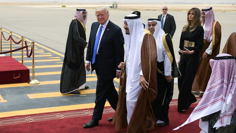 US president Donald Trump is welcomed by Saudi King Salman bin Abdulaziz al-Saud upon arrival at King Khalid International Airport in Riyadh. Photograph: Mandel Ngan/AFP/Getty Images