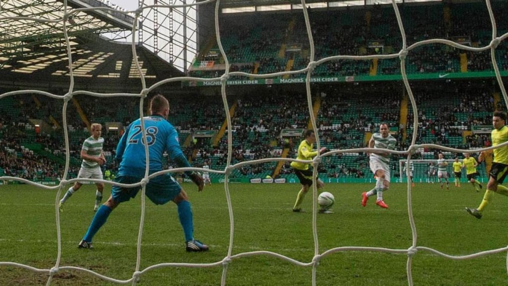 Anthony Stokes scores Celtic’s third goal during the Scottish Premiership match against St Mirren at Celtic Park. Photograph: Jeff Holmes/PA
