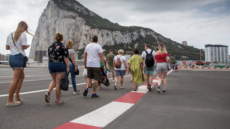 People cross the border from Spain into Gibraltar: A British territory for 300 years, Gibraltar relies on frontier workers coming from Spain for 50 per cent of its labour force. Photograph: Matt Cardy/Getty Images