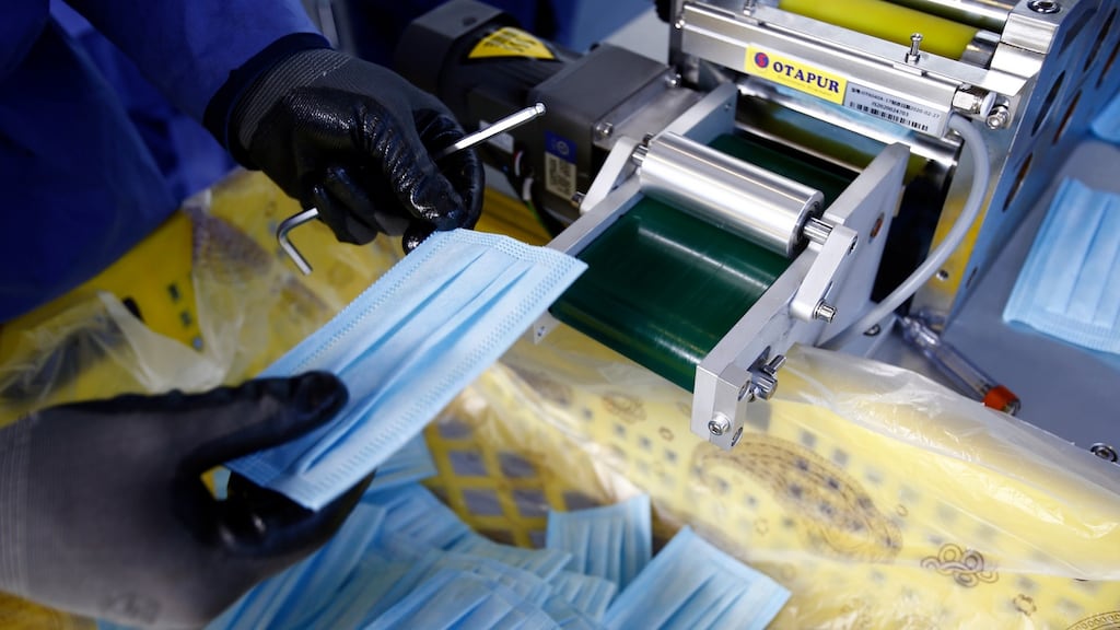 Gardaí are investigating if a Roscommon businessman was duped into taking part in a €15m scam carried out by criminals exploiting the demand for face masks during the coronavirus crisis. File photograph: Stringer/EPA